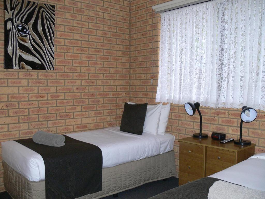 Begonia City Motor Inn แบลเลอแรต ห้อง รูปภาพ